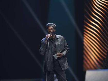 Buju Banton collects the Reggae Collaboration of the Year award on behalf of himself, Bugle and Damian Marley at last year’s Caribbean Music Awards.