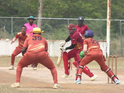 St Catherine CA batsman Rasheed Outar gathers runs on his way to a half-century during their JCA Super 50 Cup match at Port Esquivel. GC Foster wicketkeeper Romaine Bennett and bowler Javon Nembhard look on.