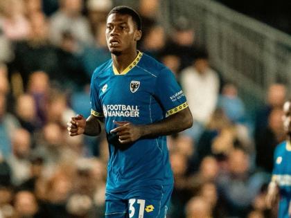Jamaican international Dujuan ‘Whisper’ Richards during his debut for AFC Wimbledon in the English League One.