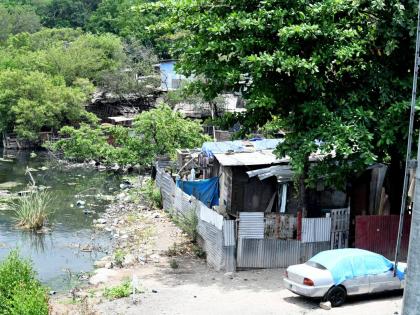 This file photo shows a section of a squatting community in New Haven, St Andrew.