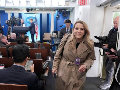 CNN Senior Reporter Betsy Klein walks through the James Brady Press Briefing Room at the White House in Washington on Thursday.