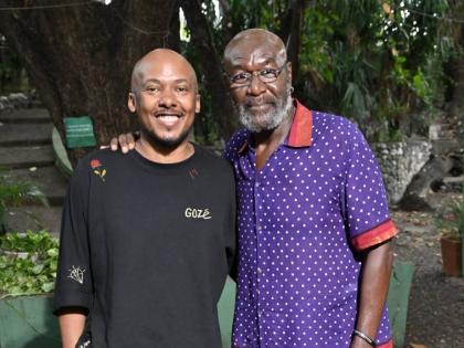 Post-’Sunday Gleaner’ interview, Lindo (right) poses with Robert Maylor, one of the producers of ‘Jabari’s People’.  Maylor produced director Storm Saulter’s 2018 film, ‘Sprinter’.