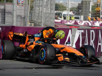 
McLaren driver Lando Norris of Britain gets out of his car after a crash during the Azerbaijan F1 Grand Prix auto race, in Baku, Azerbaijan, yesterday.