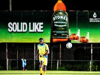 
Waterhouse FC’s Roshawn Amos passes the ball during a Jamaica Premier League football match at Drewsland’s Waterhouse Stadium.