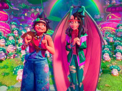 This image released by  DreamWorks Animation shows Jo, voiced by H.E.R. (left), and Raissa, voiced by Liza Soberano, in a scene from ‘Forgotten Island’.