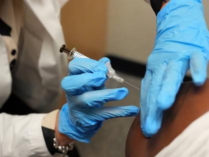 A patient receives a vaccine protecting against human papillomavirus (HPV) at a pharmacy in Miami, September 9, 2025. 