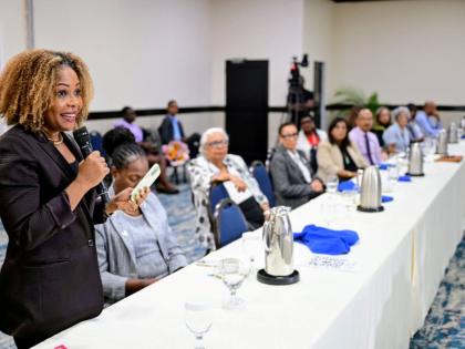 Minister of Education, Skills, Youth and Information, Senator Dr Dana Morris Dixon, responds to questions at the High-Level National Digital and AI Skills Round Table on Tuesday at The Jamaica Pegasus hotel. 