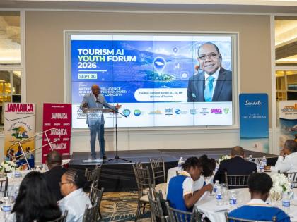 Minister of Tourism addresses Tourism Action Club members at the Tourism Awareness Week AI Youth Forum at Sandals Dunns River.