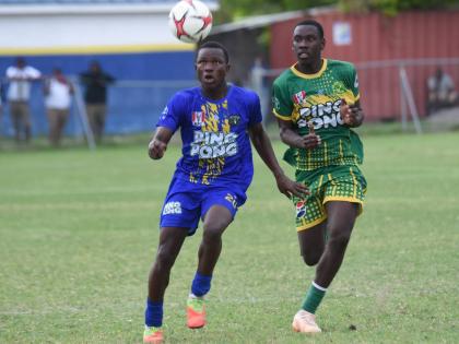 Clarendon College’s  Omario Thomas (left) is challenged by Ocho Rios High’s Ryan Francis during  their ISSA Ben Francis KO round of 16 match at Drax Hall Sports Complex on Wednesday, September 30, 2026.