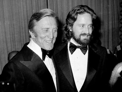 Kirk Douglas (left) appears with his son Michael Douglas at a Friar’s Club dinner in New York, on April 22, 1977.