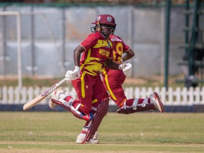 West Indies Women batters Stafanie Taylor (foreground) and Jazara Claxton go for a run during their T20I game against Zimbabwe yesterday.  