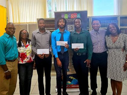 From left: Dr Rodger Williams, dean of the School of Music, Edna Manley College of the Visual and Performing Arts; Melody McDowell, assistant registrar and examinations officer; scholarship recipients Sylvauno Davy, Matthew Harrison and Daniel Brown; James