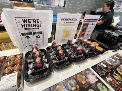 AP
A hiring sign is displayed at a food court in a grocery store in Schaumburg, United States, on Wednesday, September 16.