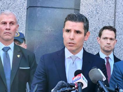 US Attorney Jamie McDonald speaking to reporters outside a federal courthouse following the announcement of new charges against former Venezuelan President Nicolás Maduro Thursday.