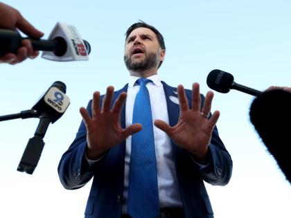Vice President JD Vance speaks with reporters at Cincinnati/Northern Kentucky International Airport in Hebron, Kentucky, on Friday before departing for a rally in Lima, Ohio. 