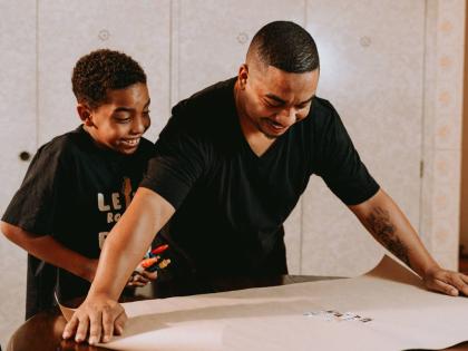 Representational image of a father and son