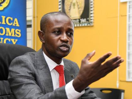 Kirk Benjamin, comissioner of customs at the Jamaica Customs Agency, speaks with The Gleaner during an interview at his Kingston office recently. 