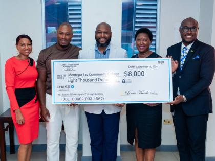 From left: Dr Sonja Madden, acting vice-principal for academics at Montego Bay Community College (MBCC); Daren Hawthorne, Omar Hawthorne and Lorna Hawthorne of the Lowell F. Hawthorne Foundation; and MBCC Principal Dr Darien Henry, following the signing of