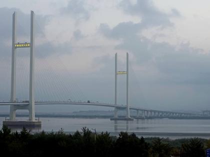 The China-North Korea Yalu River Bridge is seen from Dandong, China, at the border between the two countries.