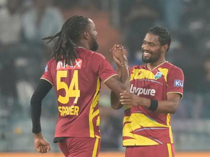 West Indies’ Keemo Paul (right) and Shamar Springer celebrate after their team won the fourth T20 cricket match against India in Hyderabad, India, on Wednesday.