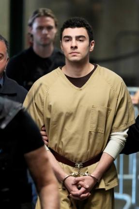 Luigi Mangione is escorted into Manhattan state court in New York, Tuesday, September 16, 2025. (AP Photo/Seth Wenig)