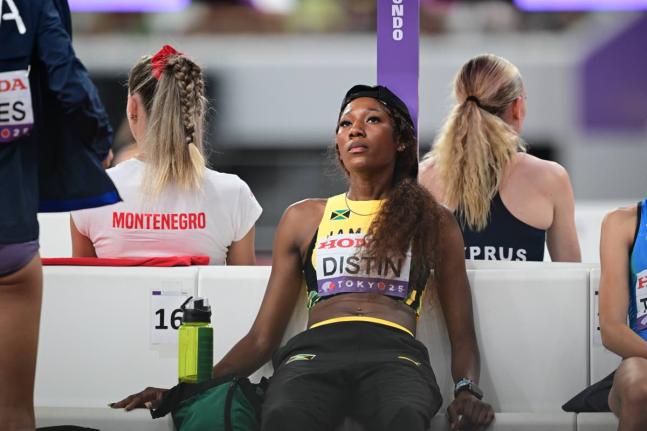 Lamara Distin slumps in her seat upon recognising that her World Athletics Championships experience was over after she failed to negotiate her opening height in the high jump inside the Japan National Stadium in Tokyo earlier today. 