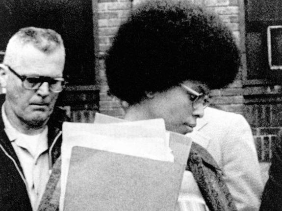 Joanne Chesimard, a member of the Black Panther Party and Black Liberation Army, leaves Middlesex County courthouse, in New Brunswick, NJ, April 25, 1977.(AP Photo, File)