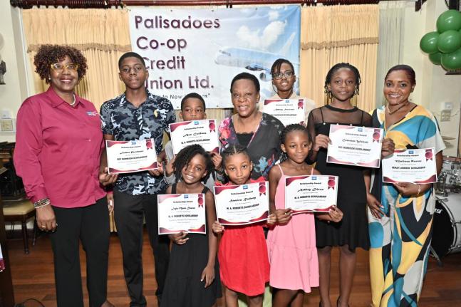 Dr Maxine Wilson (left), general manager, Palisadoes Co-operative Credit Union; and Celay Harwood-Gayle (centre), president, board of directors, pose with scholarships awardees at the Palisadoes Co-operative Credit Union Limited’s annual Scholarship Awar