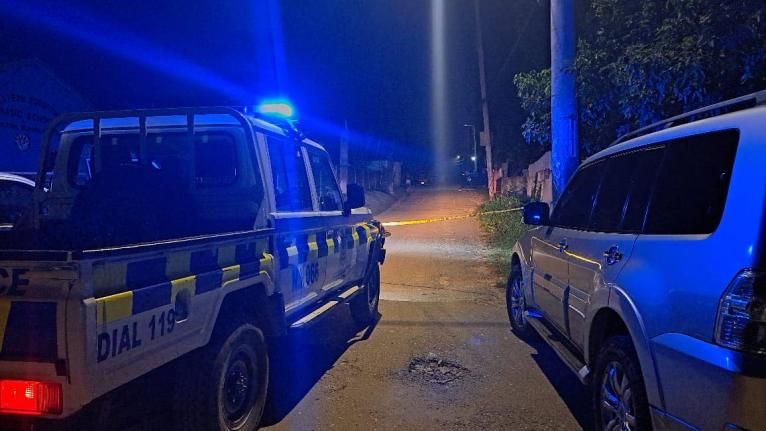 A police cordon at the scene of a mass shooting in Commodore in Linstead, St Catherine on October 5.
