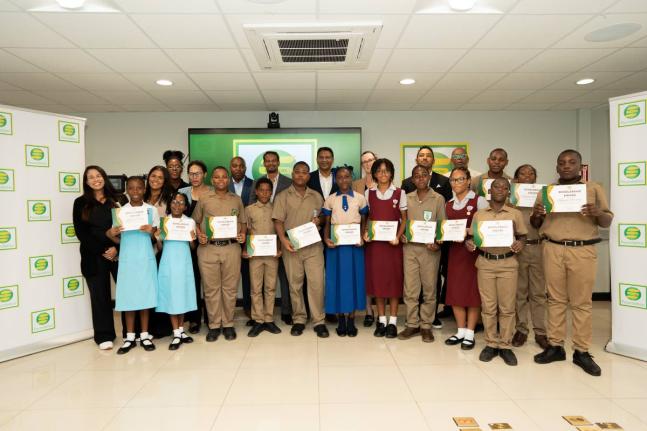 The 2025 PEP Scholarship awardees beam with pride as they celebrate their achievements at the official ceremony. Standing proudly with them are Seprod Foundation and Group leaders (back row, from left): Lisa D’Oyen, Seprod Foundation executive director; 