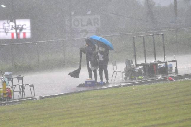 Heavy rain on Old Hope Road yesterday forced the postponement of the Manning Cup match between hosts Jamaica College and St Andrew Technical High. 