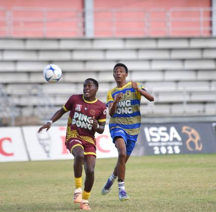 Maggotty High’s Dante Blair (left) and Rusea’s High’s Roshawn Dillion challenge for the ball during their Group One football match in the second round of the ISSA daCosta Cup at Montego Bay Sports Complex on Saturday, October 11.