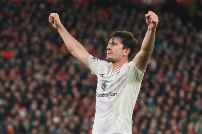 Manchester United’s Harry Maguire celebrates after scoring his side’s second goal during the English Premier League  match between Liverpool and Manchester United in Liverpool, England, yesterday.