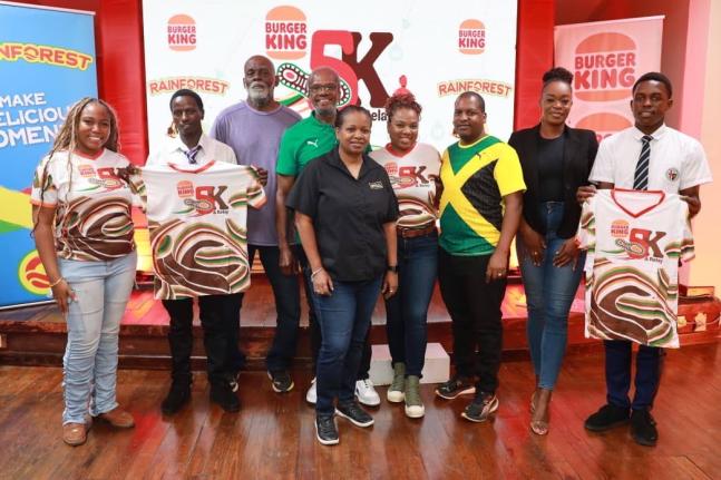 From left: Burger King Jamaica (BK) communication, community and strategy executive, Rashai Graham; Kingston College (KC) athlete, Stephen Mutili, KC middle-distance track coach, Hamlin Pagon; Running Events managing director, Alfred Francis, McCain Calati