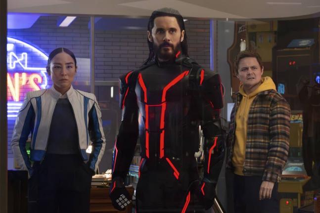 This image released by Disney shows (from left) Greta Lee, Jared Leto and Arturo Castro in a scene from ‘Tron: Ares’. 