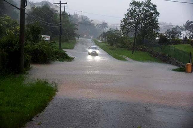 Flood waters along Ward Avenue in Mandeville, Manchester from Hurricane Melissa.