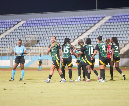 Jamaica’s Reggae Girlz celebrate one of the four goals they put past Trinidad and Tobago in a 4-1 win at the Ato Boldon Stadium on Tuesday. 