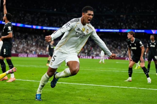 Real Madrid’s Jude Bellingham celebrates after scoring his side’s first goal during the Champions League opening phase match against Juventus in Madrid, Spain, on October 22.