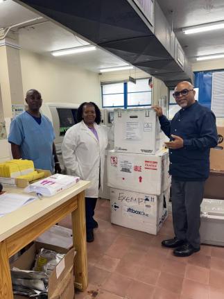 Consultant Haematologist-Oncologist at Health Services Authority in the Cayman Islands, Dr Lundie Richards, with staff at the National Blood Transfusion Service (Blood Bank) in Jamaica. The country donated a supply of blood and plasma to Jamaica following 