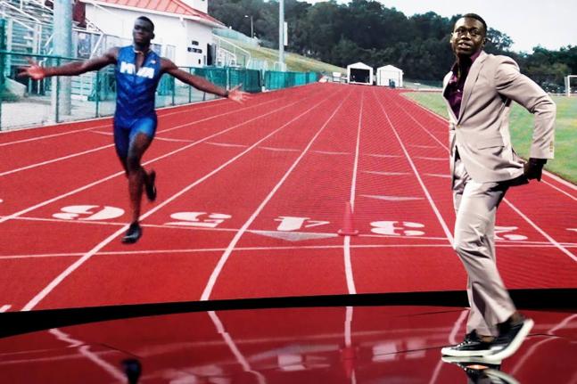 Issam Asinga, a track and field competitor, is introduced at the annual awards for high school athletes on July 11, 2023 in Los Angeles.