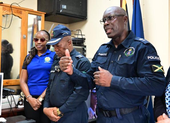 Superintendent of Police Coleridge Minto (right), head of the St Elizabeth Police, speaks with The Gleaner at the Black River Police Station on Thursday. Looking on are Sergeant Arleen McBean, chairman of the Police Federation, and Assistant Commissioner o