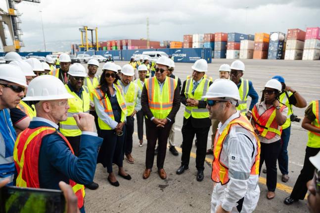David Liner, executive vice president and chief operating officer, Excelerate Energy (2nd left) in conversation with Dr Christopher Tufton, minister of health and wellness at the Kingston Freeport Terminal, as they gather to welcome the arrival of Exceler