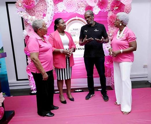 Over the past 25 years, the Pink Run has grown into Jamaica’s flagship breast cancer fundraiser. Alfred Francis, managing director, Running Events Jamaica (second right), explains this year’s New Kingston route to Carolind Graham (left), chairperson, J