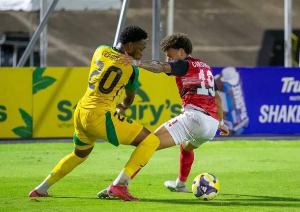 Renaldo Cephas (left) scored for Jamaica in last night’s match against hosts Trinidad and Tobago in their Concacaf World Cup qualifying match. 