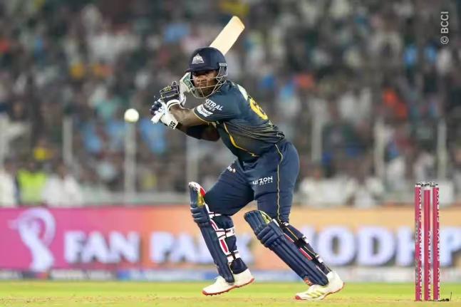 Gujarat Titans batsman Sherfane Rutherford plays a shot during his innings of 46 against the Punjab Kings at the Narendra Modi Stadium, in Ahmedabad yesterday.