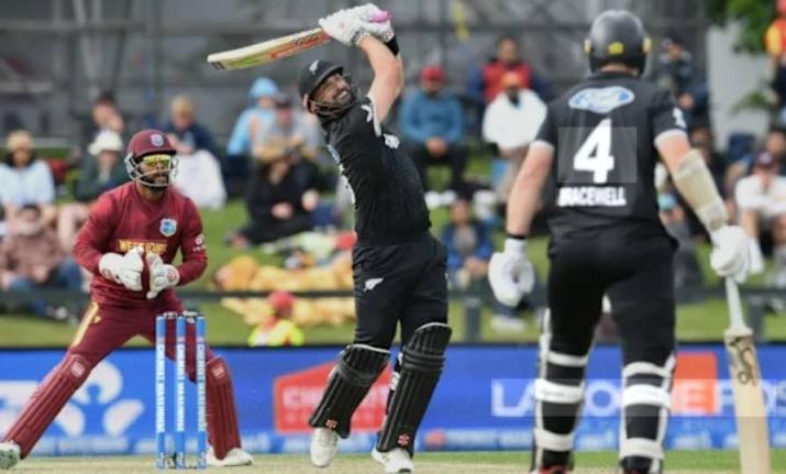 Daryl Mitchell on the go during his match-winning century against the West Indies.