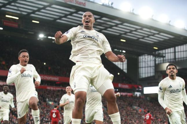 
Nottingham Forest’s Murillo (centre) celebrates after scoring his side’s opening goal during the English Premier League football match against Liverpool in Liverpool, England, yesterday.