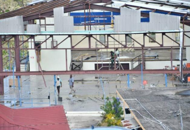 Volunteers repair a building at the Westwood High School for Girls in Trelawny during a repair and clean-up exercise at the school on Friday, November 21, 2025.