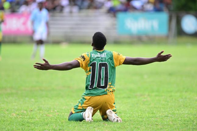 Damarley Williams of Excelsior High School celebrates scoring against St Georges College in an ISSA/WATA Manning Cup game at Winchester Park on October 11.