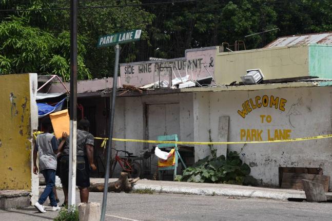 Park Lane, off Red Hills Road in St Andrew, was the scene of another murder on Sunday.